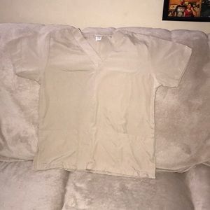 B.A.G. Small Tan scrub top with pockets V neck 💕